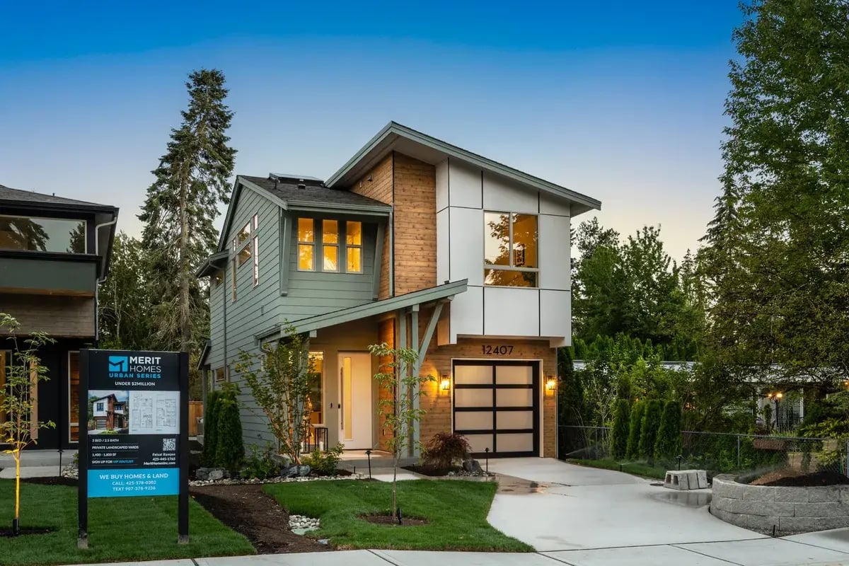 Hilo Lot 1 Exterior Image with a Northwest Contemporary Style Home and twilight lighting in the background